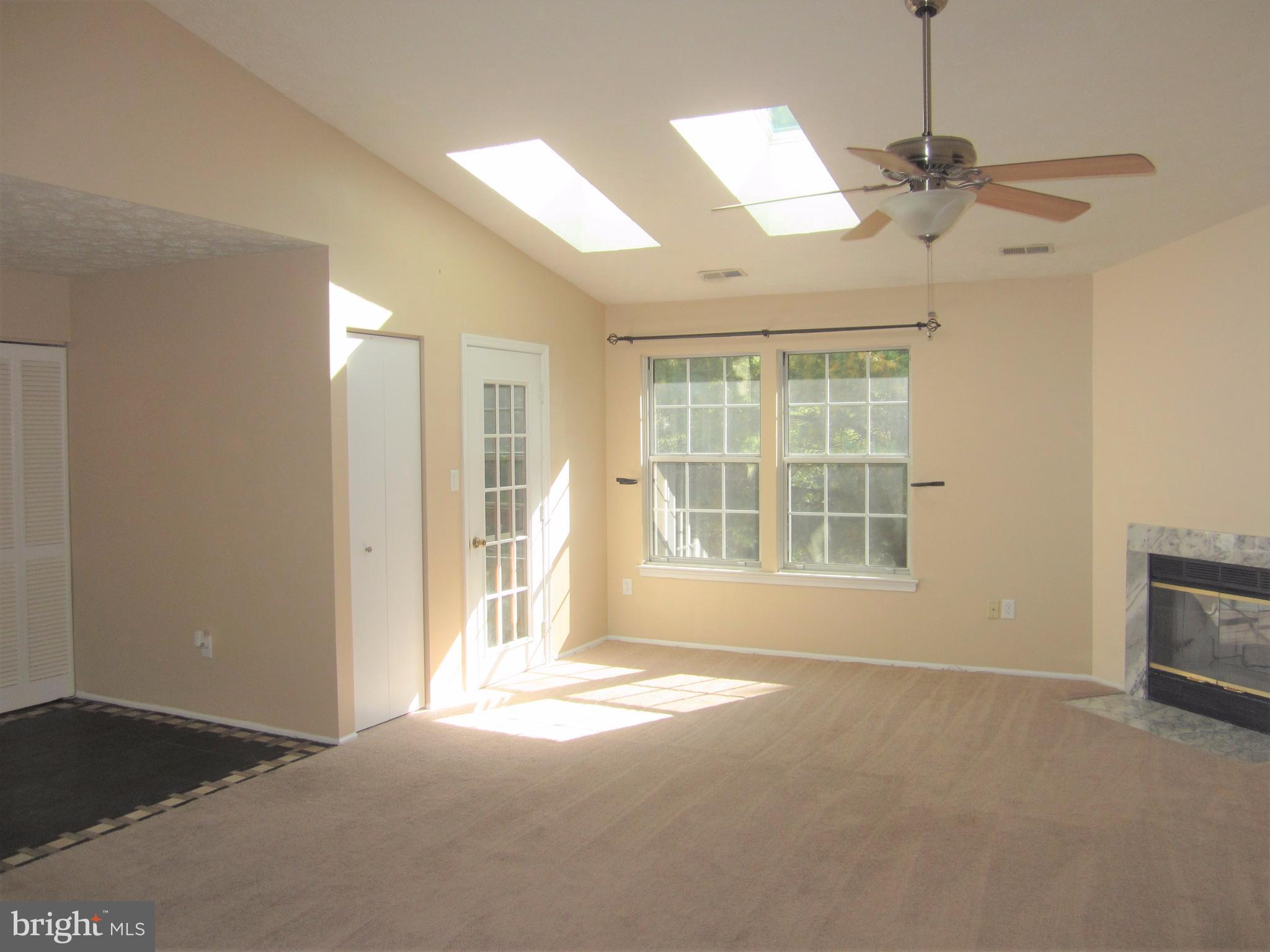 17 Bridle Lane, Unit 72 Baltimore, MD 21236 - Photo 3 of 22 a view of an empty room with a window