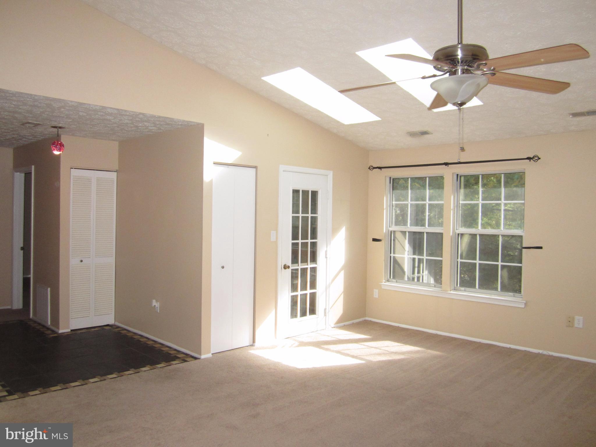 17 Bridle Lane, Unit 72 Baltimore, MD 21236 - Photo 4 of 22 a view of an empty room with a window