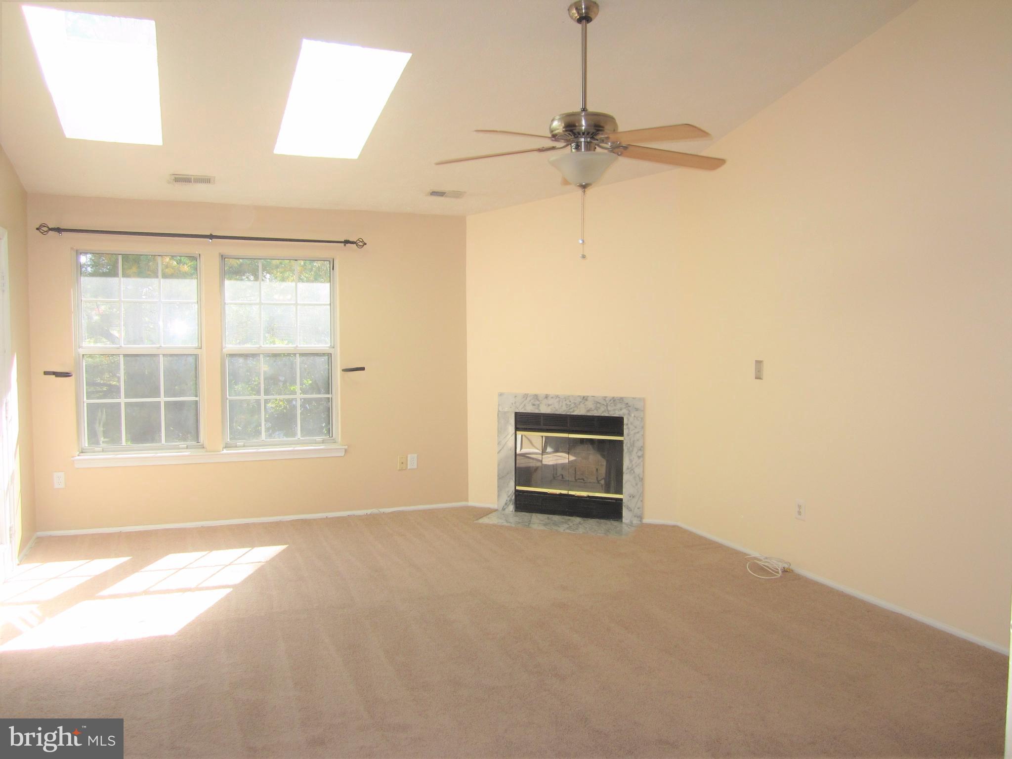 17 Bridle Lane, Unit 72 Baltimore, MD 21236 - Photo 5 of 22 a view of an empty room with a window