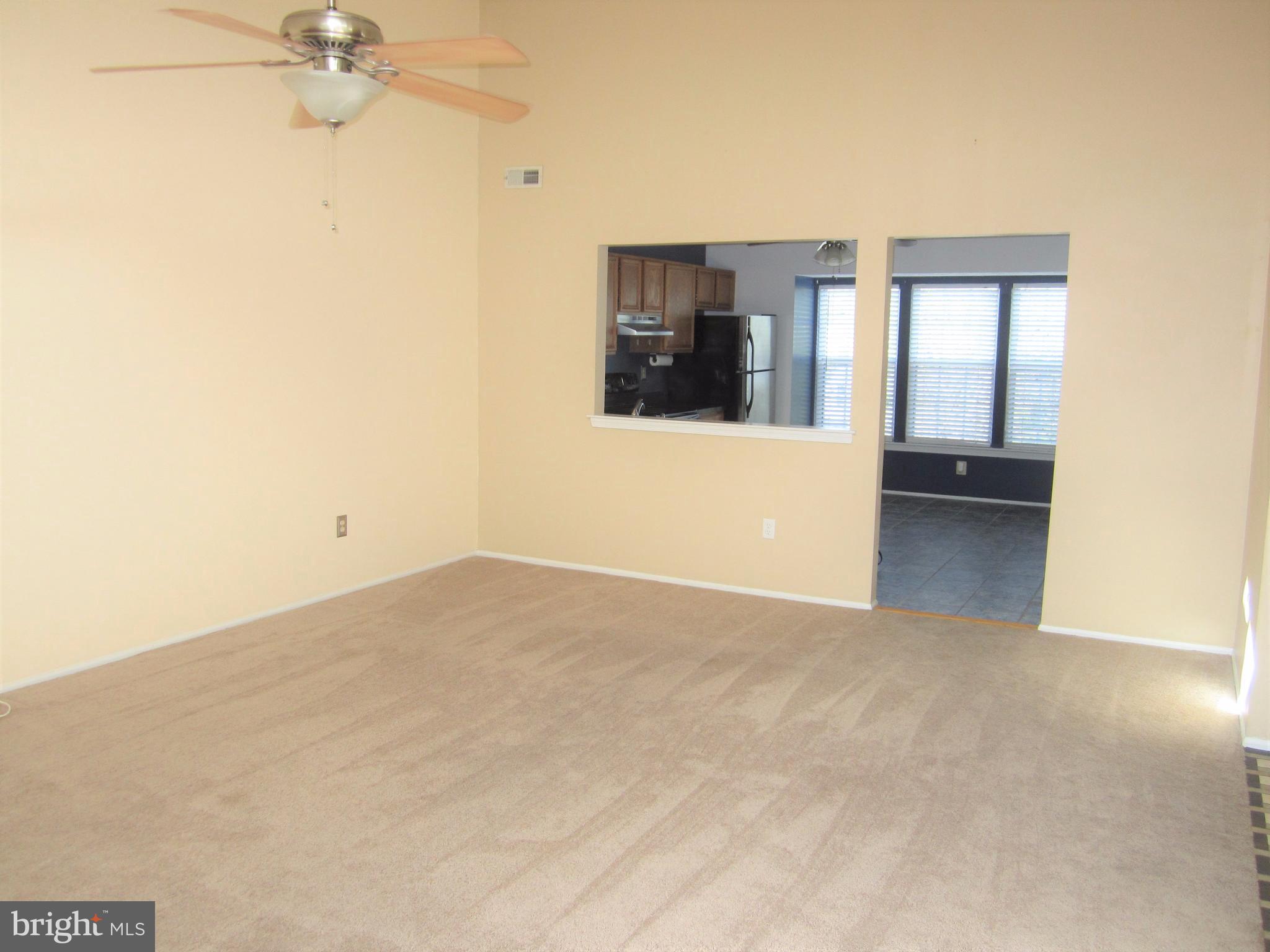 17 Bridle Lane, Unit 72 Baltimore, MD 21236 - Photo 8 of 22 a view of an empty room with a window