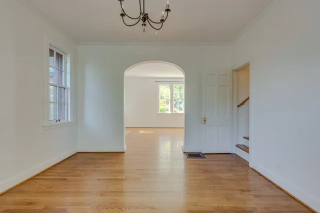 a kitchen with stainless steel appliances granite countertop sink stove top oven and cabinets