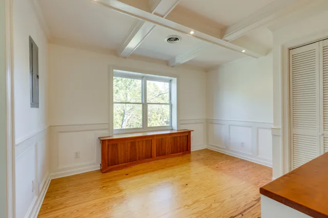 a spacious bathroom with a granite countertop tub sink and mirror