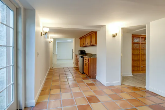 a bathroom with a toilet sink and shower