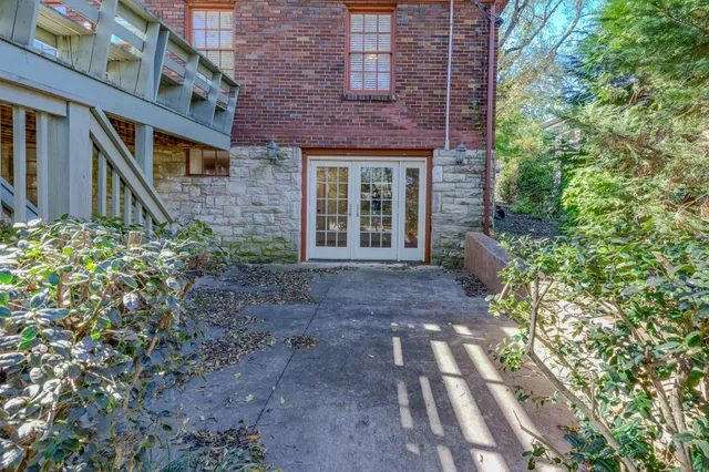 a view of a brick building with many windows