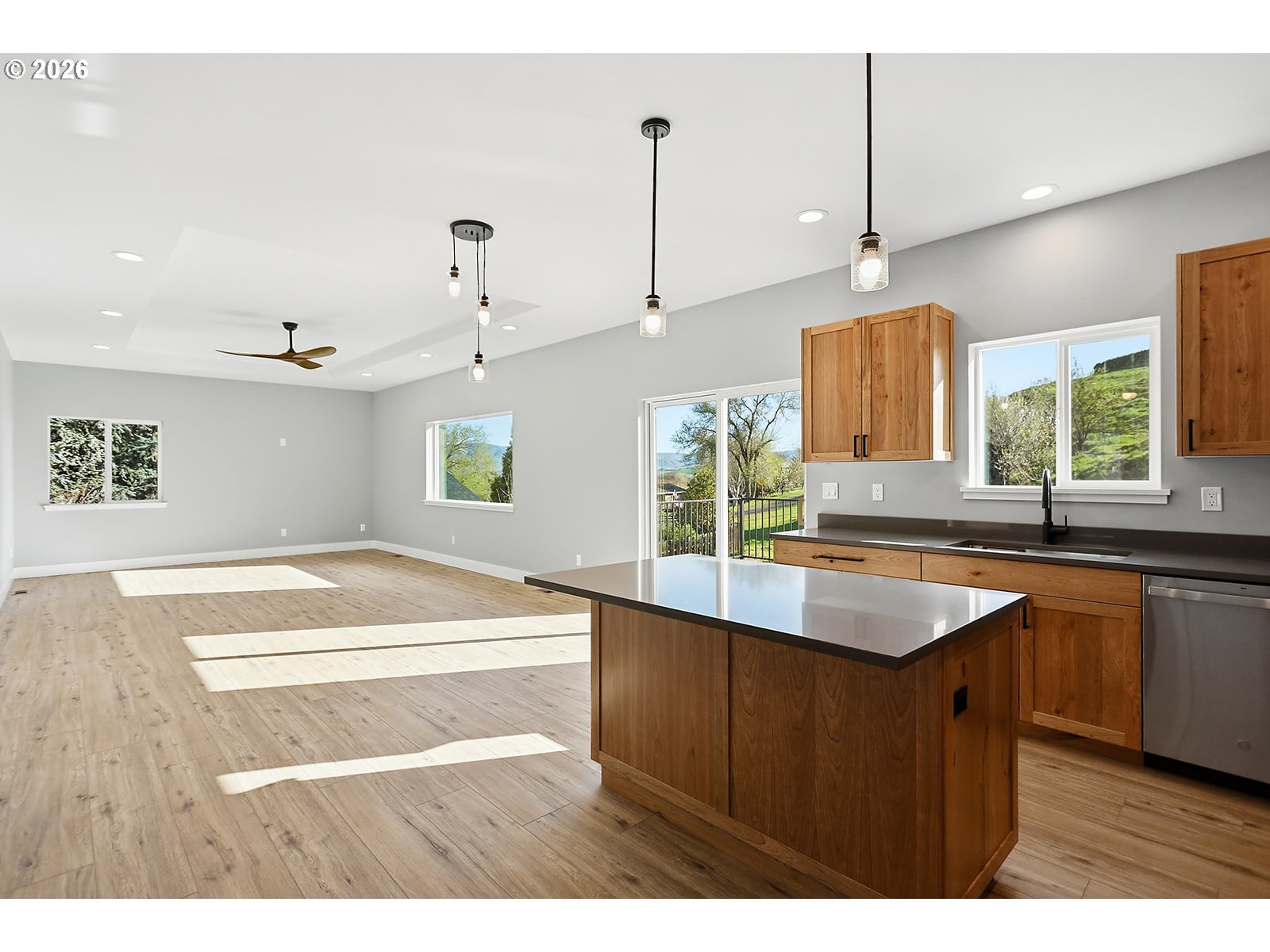 1680 Morton Street The Dalles, OR 97058 - Photo 12 of 36 a kitchen with a sink a counter top space and cabinets