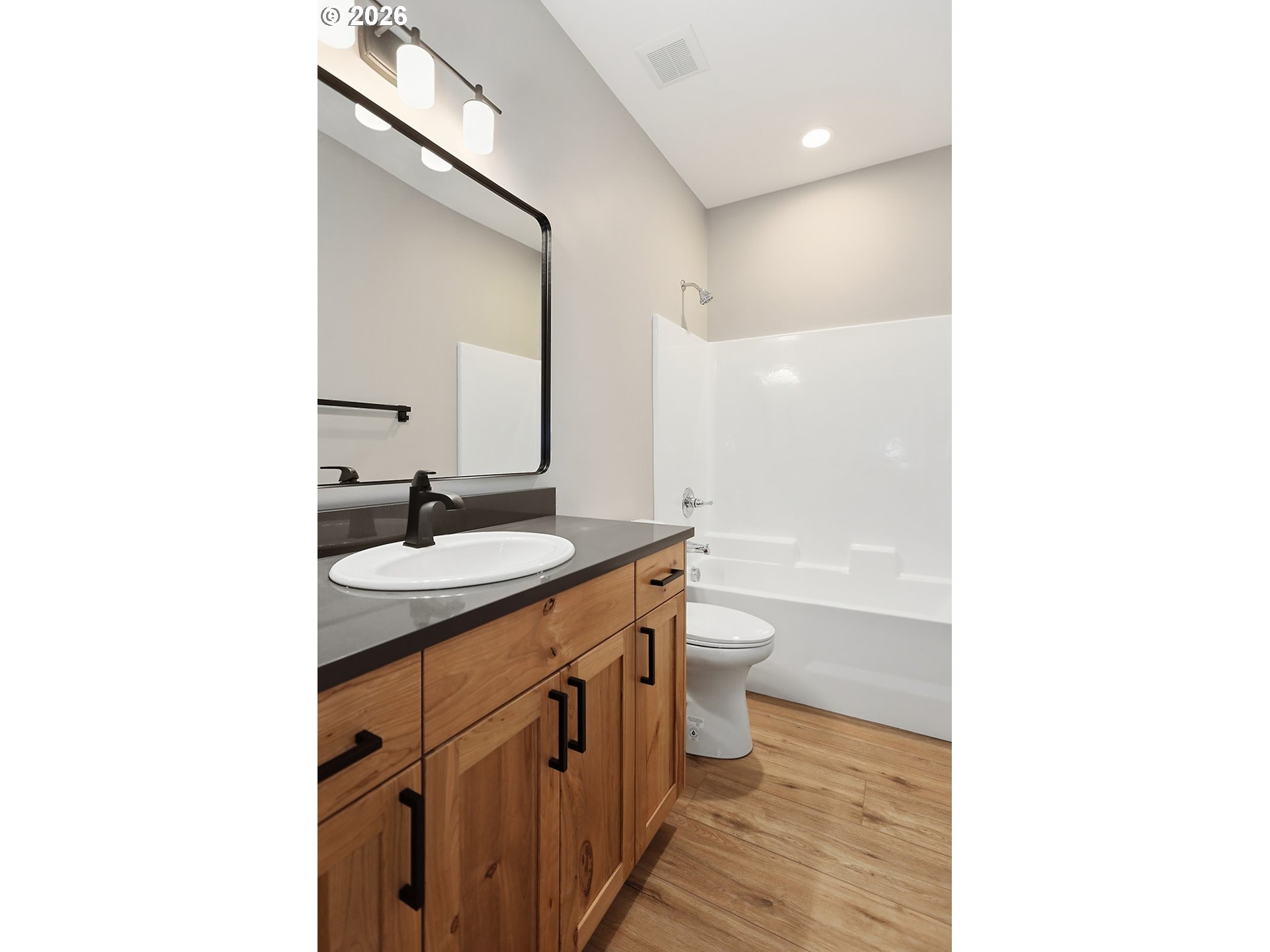 1680 Morton Street The Dalles, OR 97058 - Photo 30 of 36 a bathroom with a sink a toilet and shower