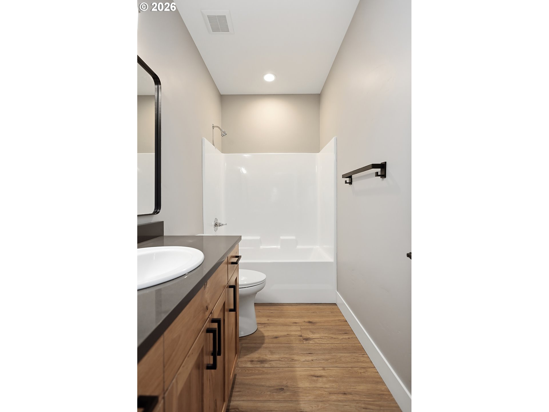 1680 Morton Street The Dalles, OR 97058 - Photo 31 of 36 a bathroom with a sink and a mirror