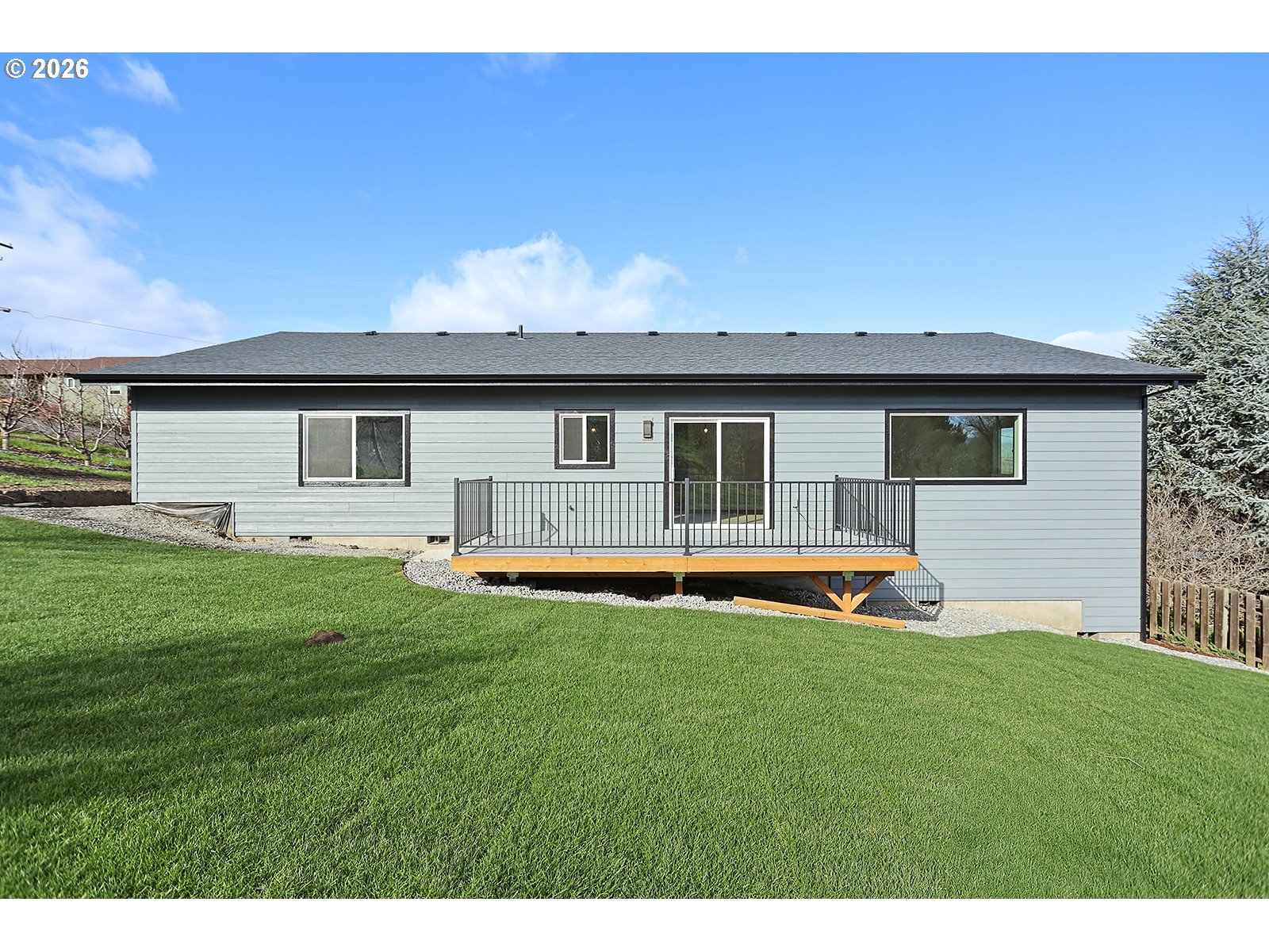 1680 Morton Street The Dalles, OR 97058 - Photo 4 of 36 a view of a house with a backyard