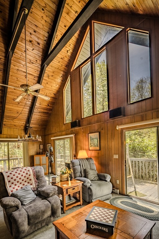 107-109 Shagbark Road Beech Mountain, NC 28604 - Photo 9 of 45 a living room with furniture and a window
