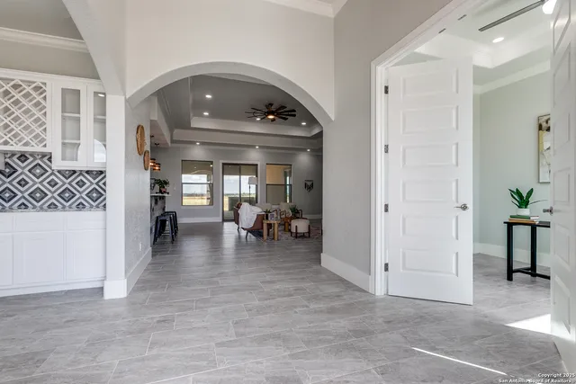a view of livingroom with furniture and staircase