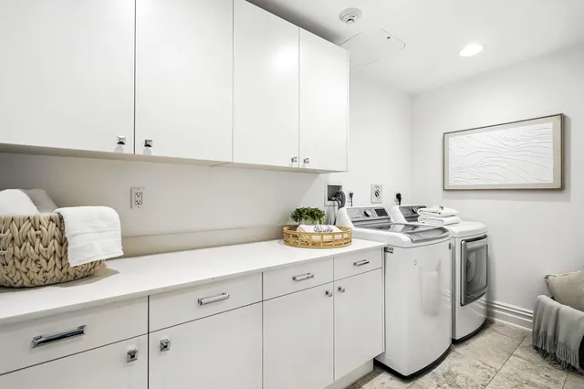 a bathroom with a sink and a window