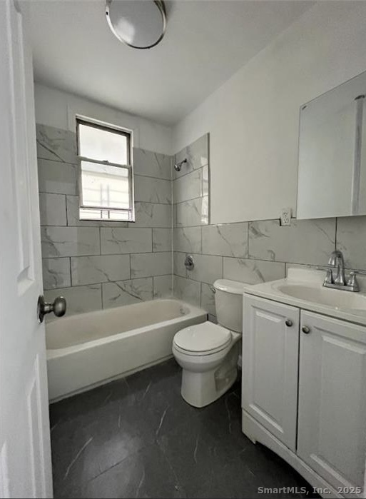 511 East Main Street Bridgeport, CT 06608 - Photo 6 of 6 a bathroom with a toilet sink and bathtub
