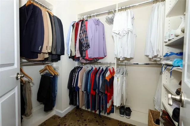 a bathroom with a bathtub and a window