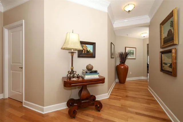 a view of a chairs and table in the balcony