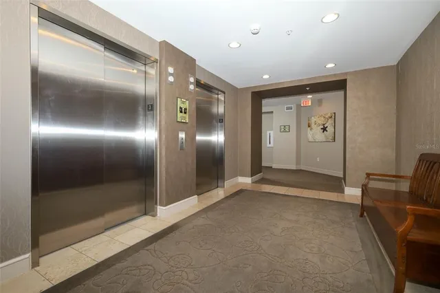 a view of a balcony with chairs