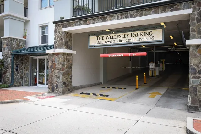 a room with gym equipment and a flat screen tv