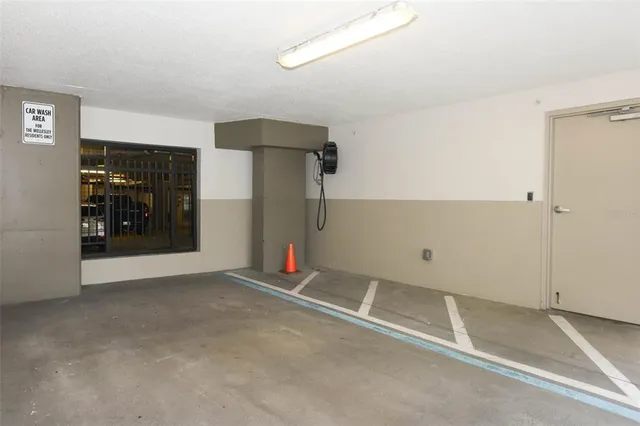 a view of a patio with a table and chairs