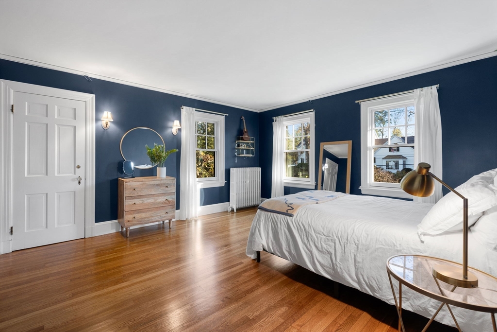 21 Rockridge Road Wellesley, MA 02481 - Photo 11 of 18 a bedroom with bed and wooden floor