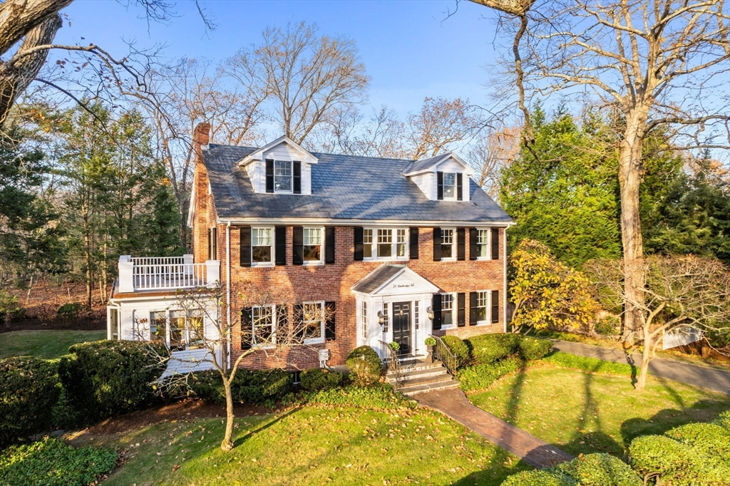 21 Rockridge Road Wellesley, MA 02481 - Photo 16 of 18 a front view of a house with swimming pool