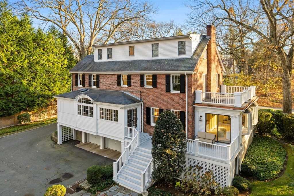 21 Rockridge Road Wellesley, MA 02481 - Photo 17 of 18 front view of a house with a yard