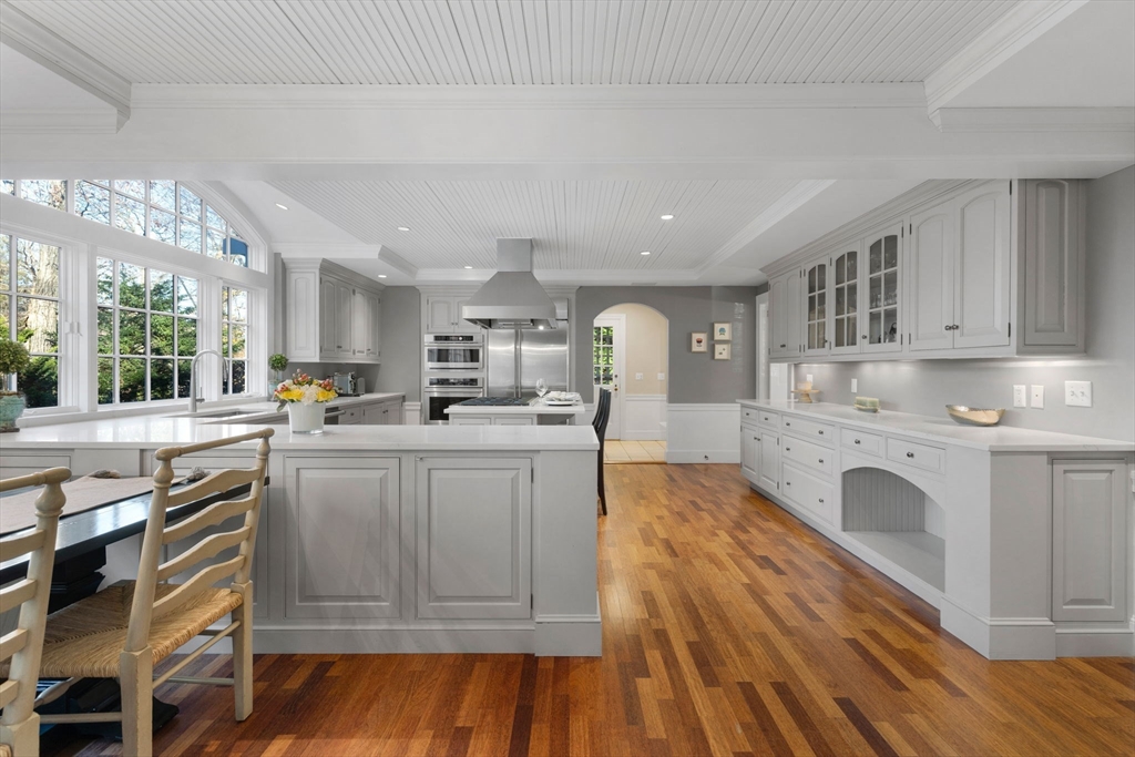 21 Rockridge Road Wellesley, MA 02481 - Photo 5 of 18 a kitchen with cabinets and wooden floor