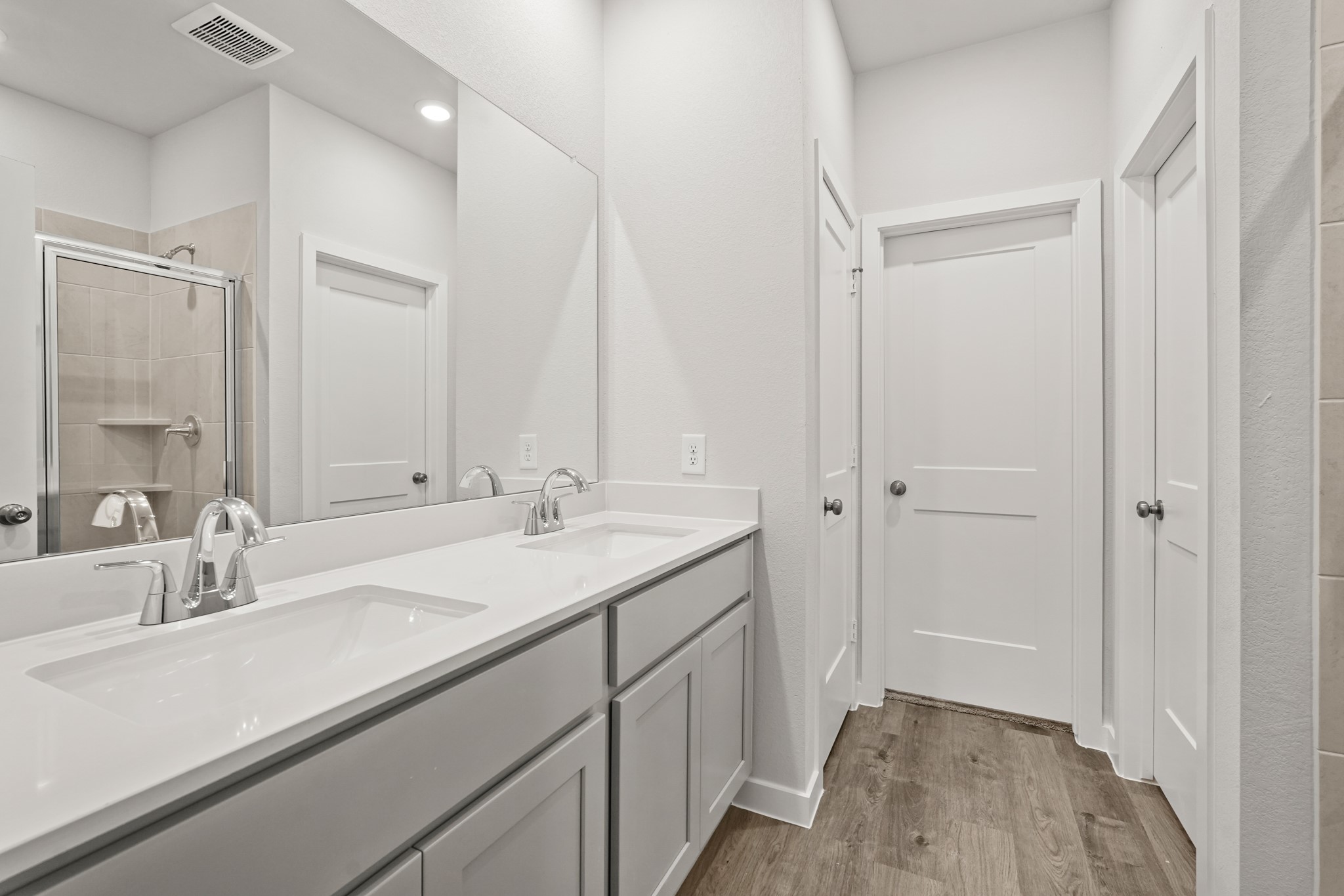 213 Spring Drive Hockley, TX 77447 - Photo 15 of 26 a bathroom with a sink and a mirror