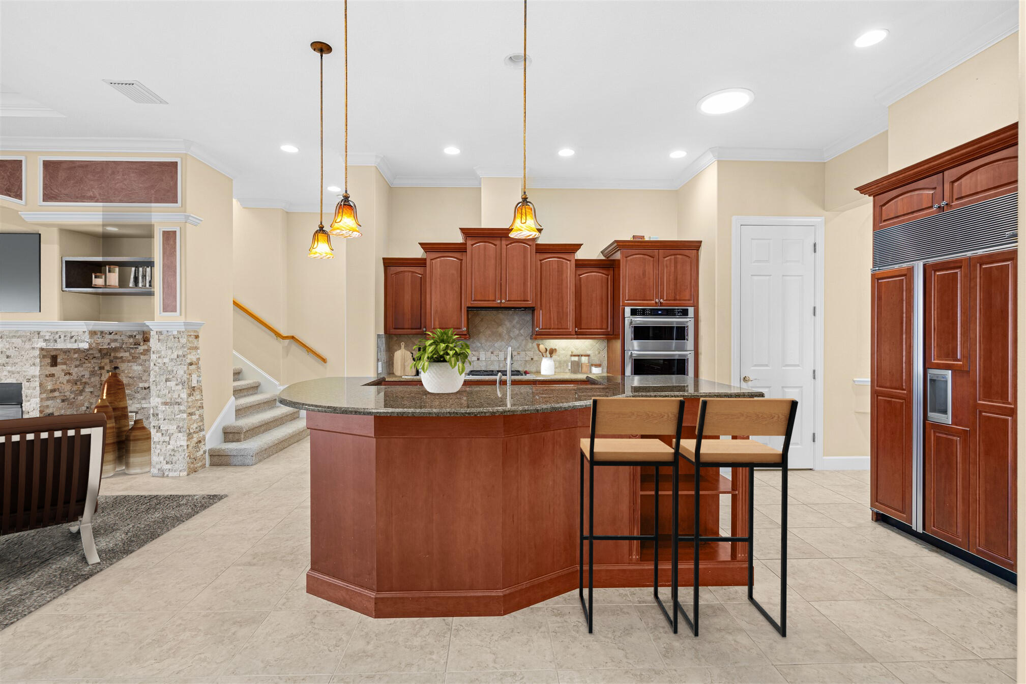 2863 BELLWIND Circle Rockledge, FL 32955 - Photo 16 of 79 a view of kitchen with stainless steel appliances kitchen island granite countertop dining table chairs sink and cabinets
