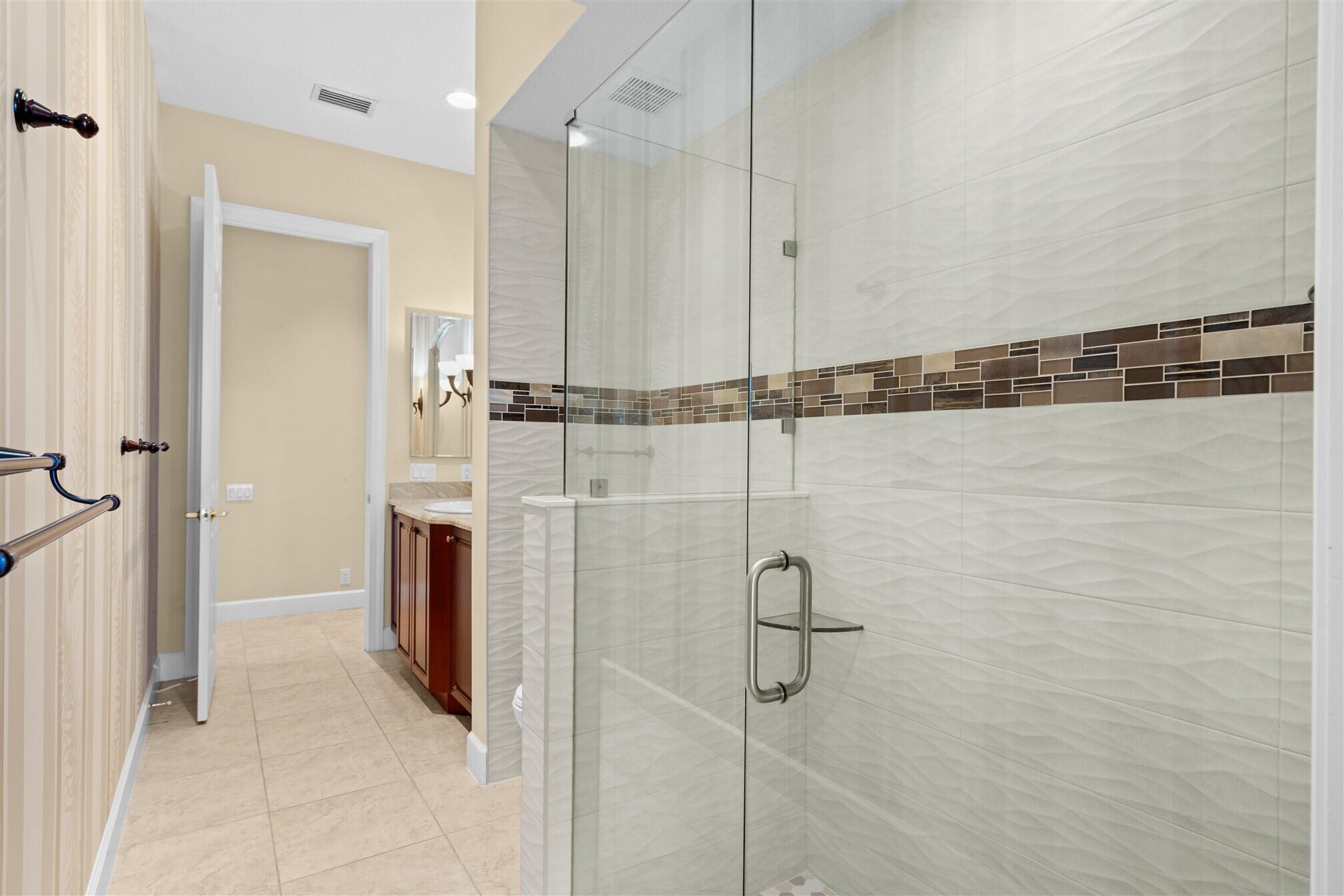 2863 BELLWIND Circle Rockledge, FL 32955 - Photo 34 of 79 a view of a bathroom with a shower