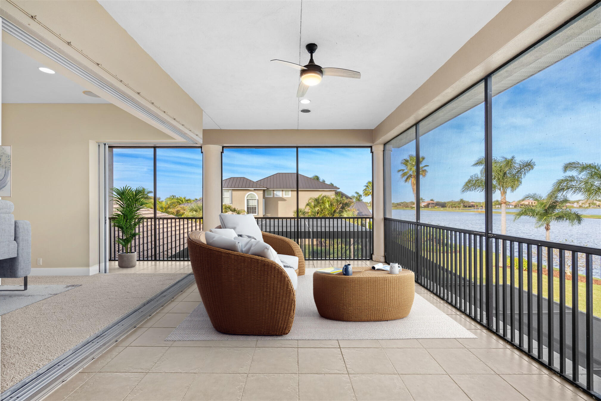 2863 BELLWIND Circle Rockledge, FL 32955 - Photo 51 of 79 a living room with couch and a floor to ceiling window