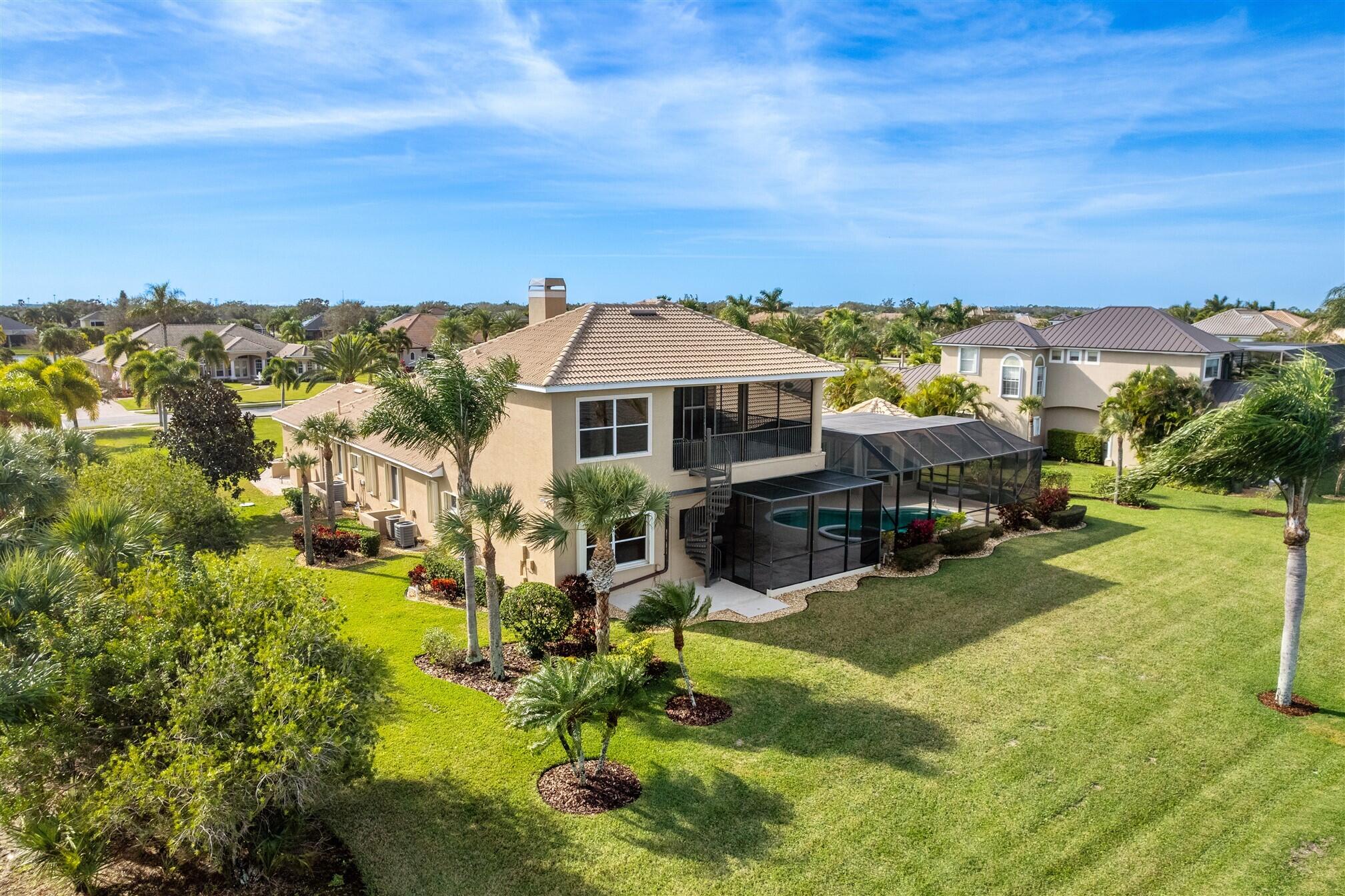 2863 BELLWIND Circle Rockledge, FL 32955 - Photo 7 of 79 a view of residential houses with yard and mountain view in back