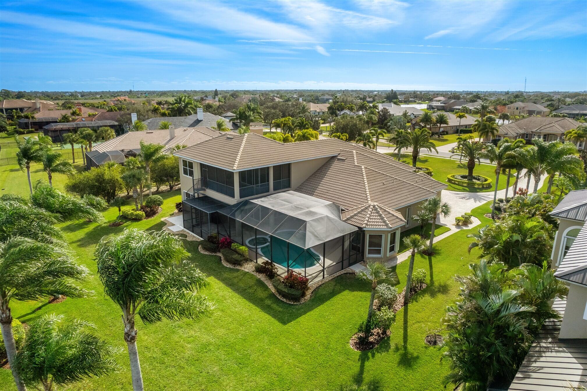 2863 BELLWIND Circle Rockledge, FL 32955 - Photo 8 of 79 an aerial view of a house with a big yard