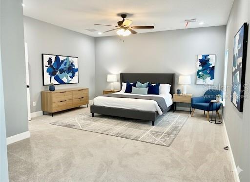 314 15th Avenue Ocoee, FL 34761 - Photo 18 of 37 a bedroom with a bed and a chandelier