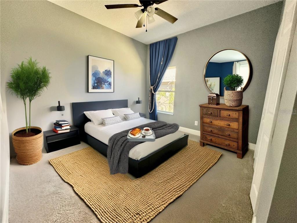 314 15th Avenue Ocoee, FL 34761 - Photo 21 of 37 a bedroom with a bed and a chandelier