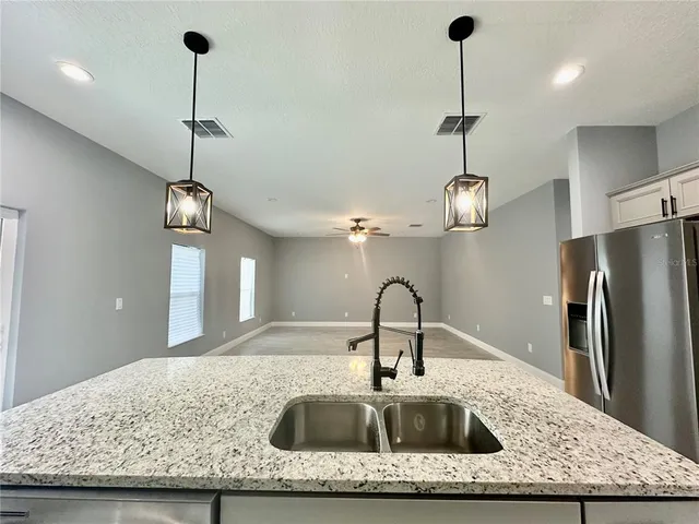 en view of a hallway with wooden floor