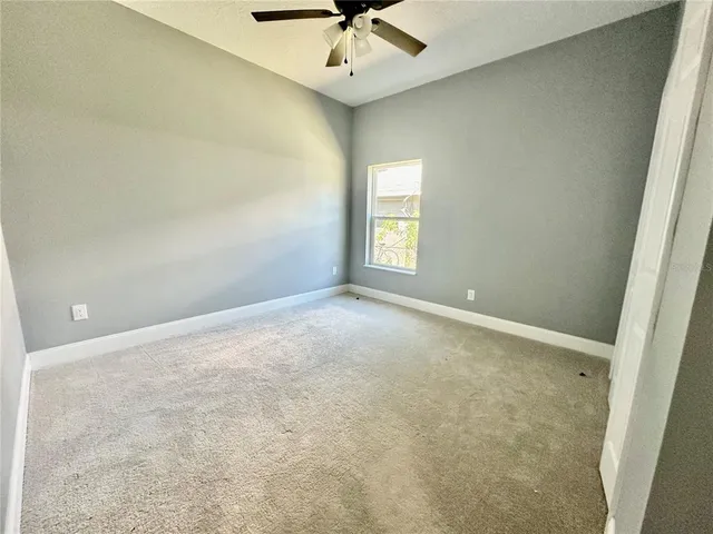 a view of a livingroom with wooden floor