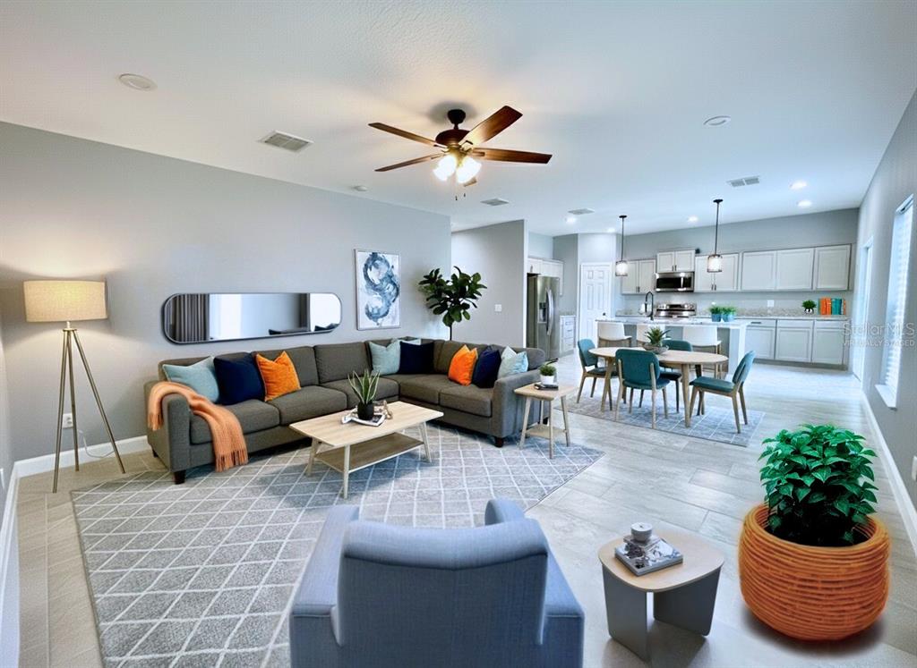314 15th Avenue Ocoee, FL 34761 - Photo 8 of 37 a living room with furniture and a potted plant