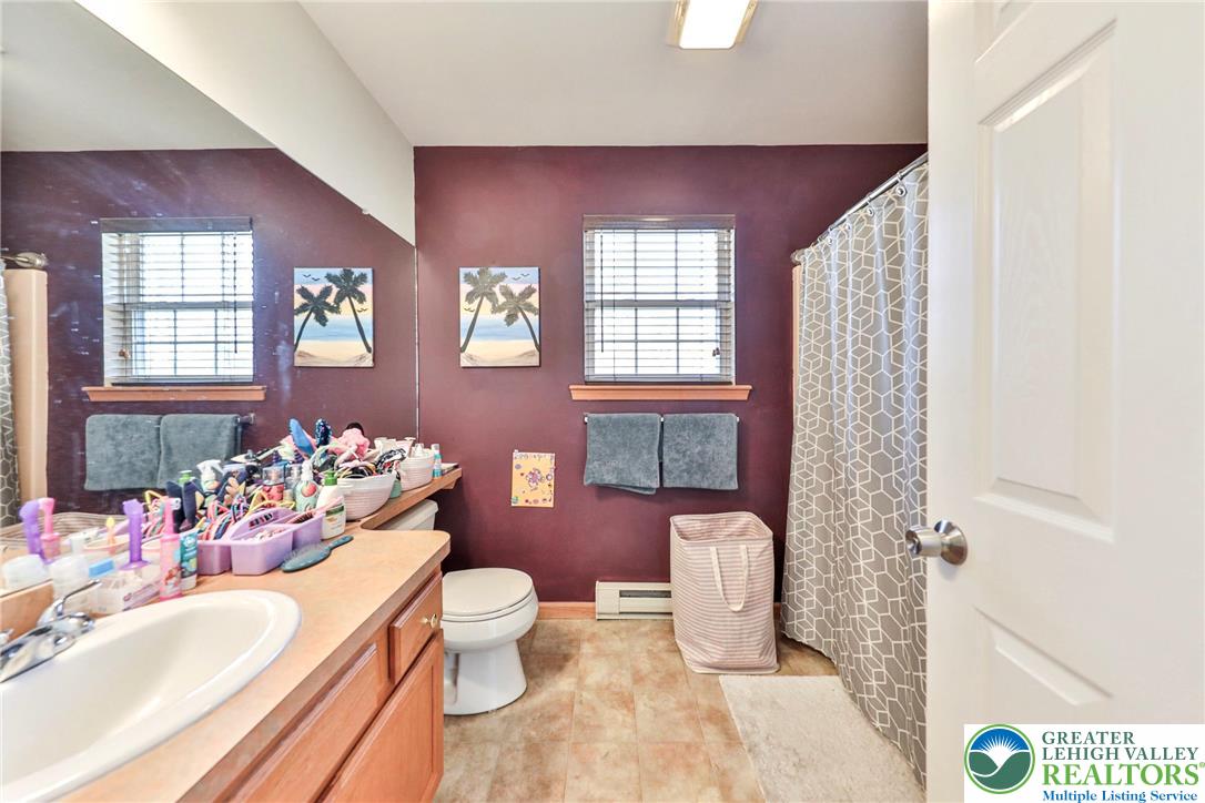 2260 Reo Drive Effort, PA 18330 - Photo 24 of 40 a bathroom with a sink toilet tub and shower
