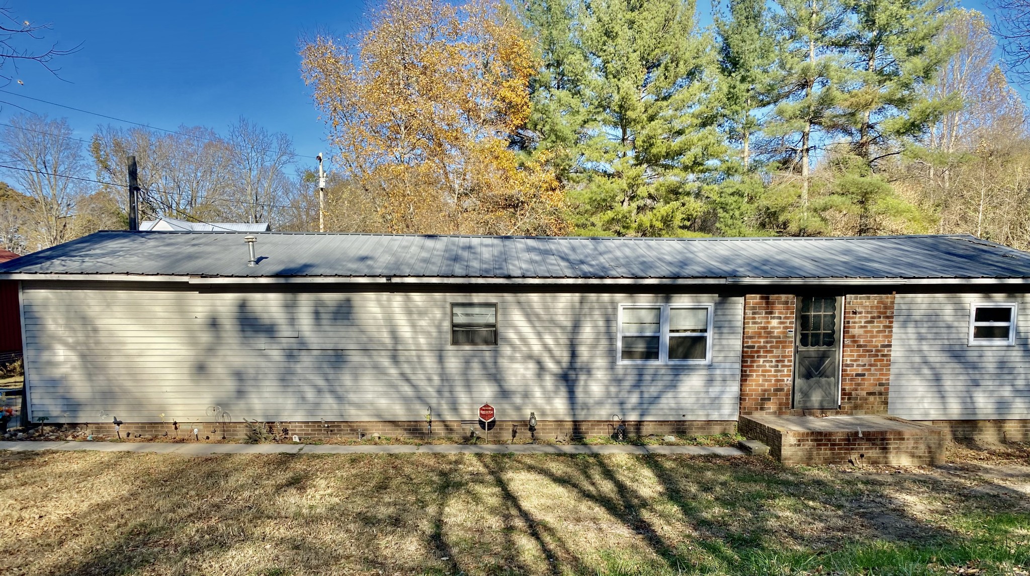 14 D Sain Road Manchester, TN 37355 - Photo 2 of 17 a backyard of a house with table and chairs