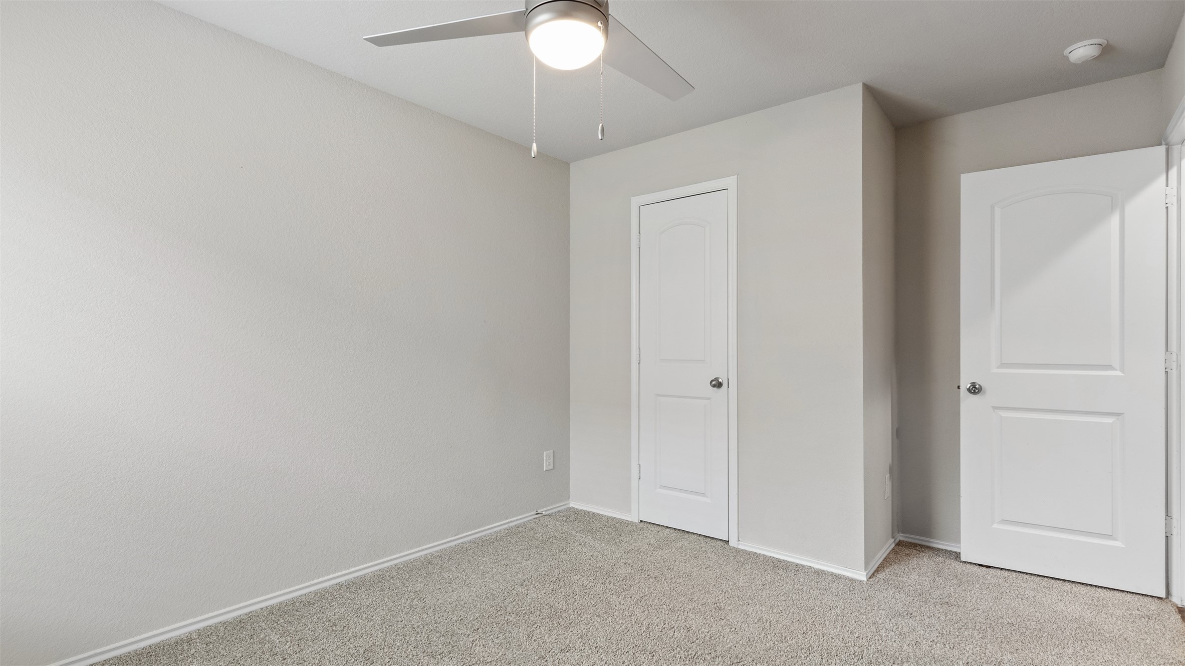 2311 Silver Plume Lane Spring, TX 77373 - Photo 14 of 24 an empty room with a chandelier fan