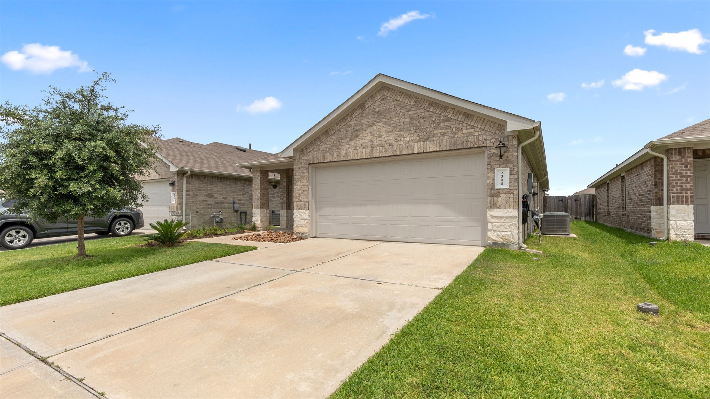 2311 Silver Plume Lane Spring, TX 77373 - Photo 2 of 24 a front view of house with yard and green space