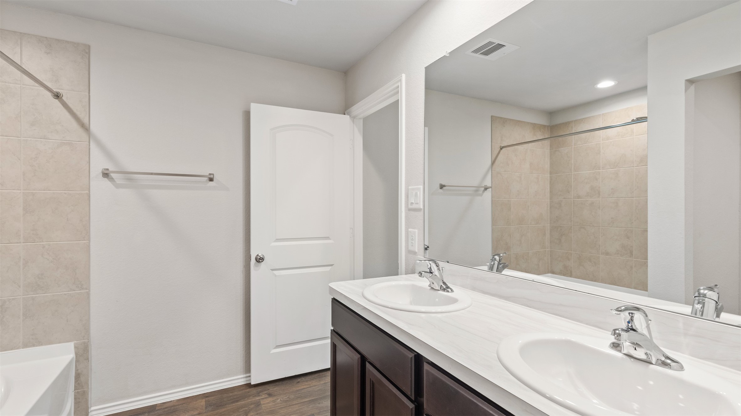 2311 Silver Plume Lane Spring, TX 77373 - Photo 21 of 24 a bathroom with a granite countertop sink and a mirror
