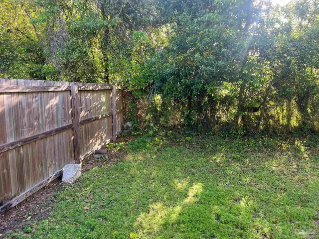 a view of a lush green space