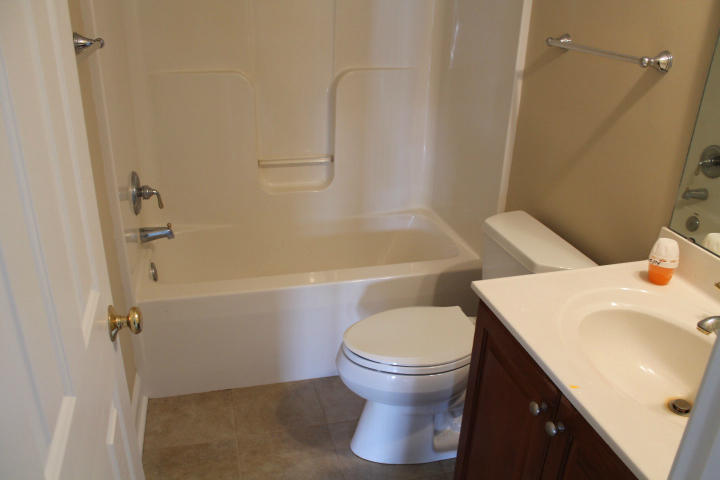 2463 Dillards Hill Road Union Hall, VA 24176 - Photo 12 of 14 a bathroom with a sink toilet and shower