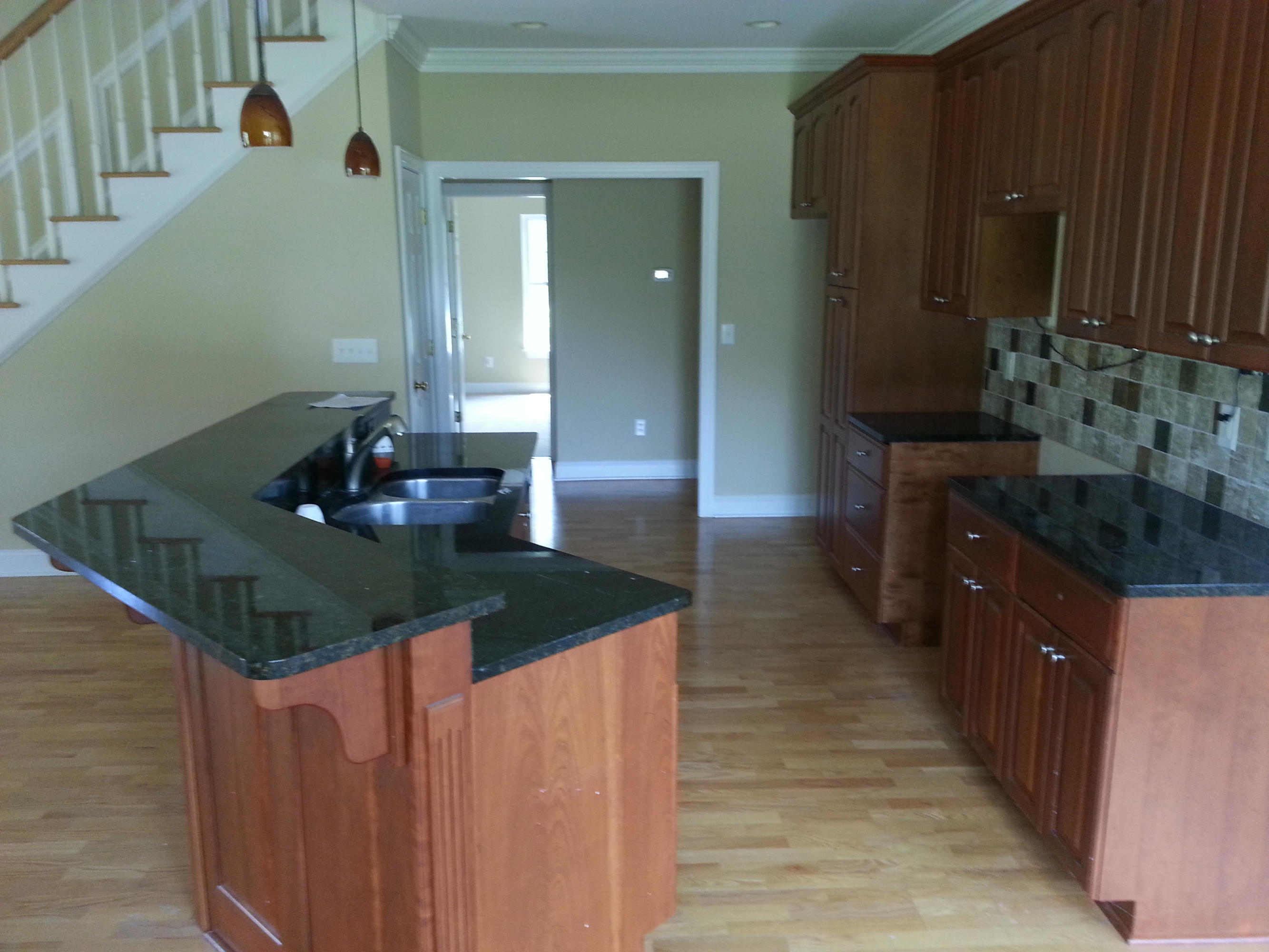2463 Dillards Hill Road Union Hall, VA 24176 - Photo 5 of 14 a kitchen with sink a mirror and vanity