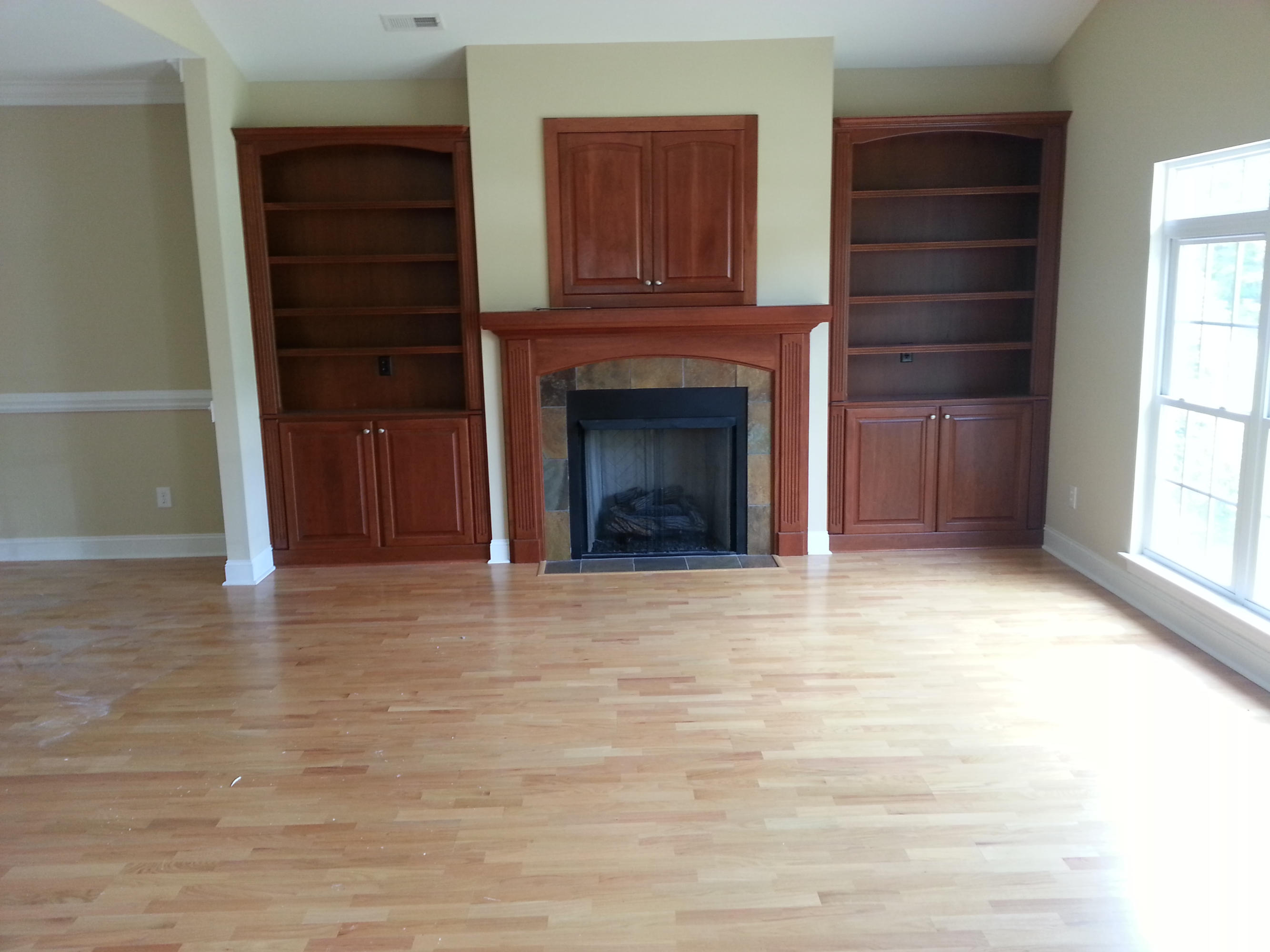 2463 Dillards Hill Road Union Hall, VA 24176 - Photo 7 of 14 a view of an empty room with a fireplace and a window