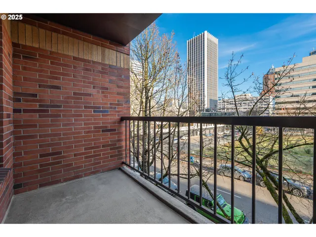 a view of a balcony with a pot