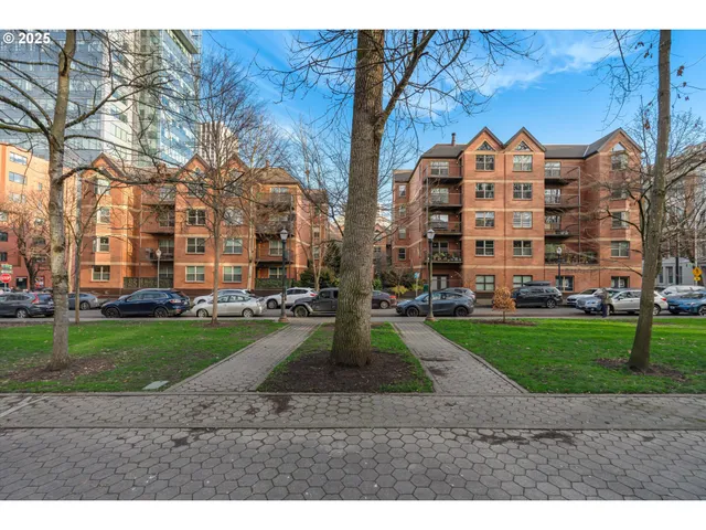 front view of a building with a yard
