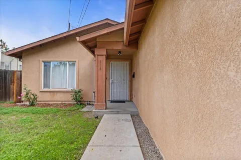 a view of a back yard of the house