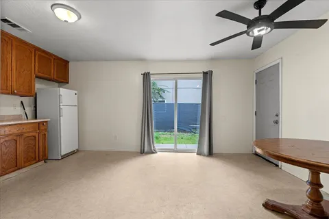 a view of a livingroom with furniture