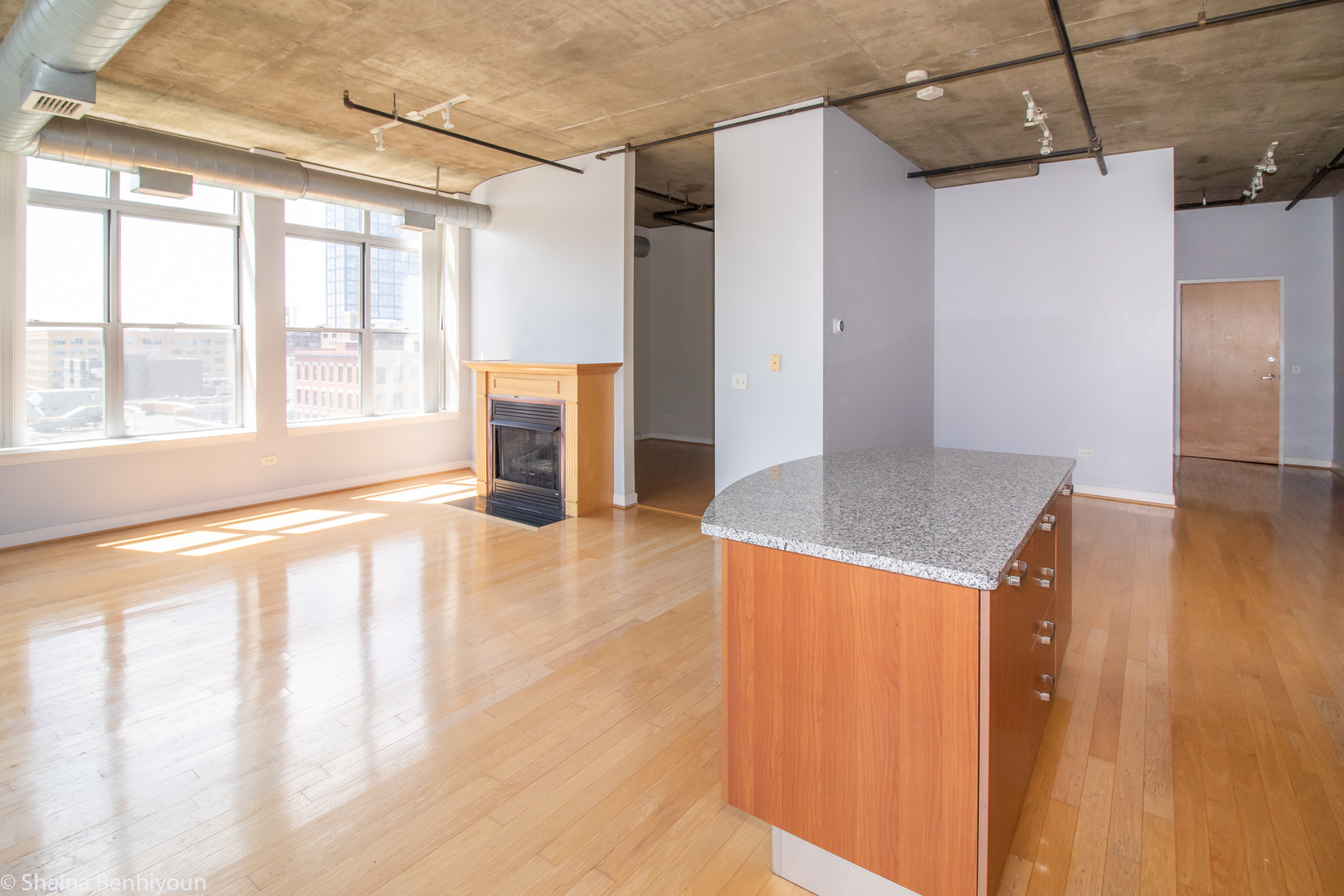 111 South Morgan Street, Unit 715 Chicago, IL 60607 - Photo 13 of 17 a view of empty room with wooden floor and fan